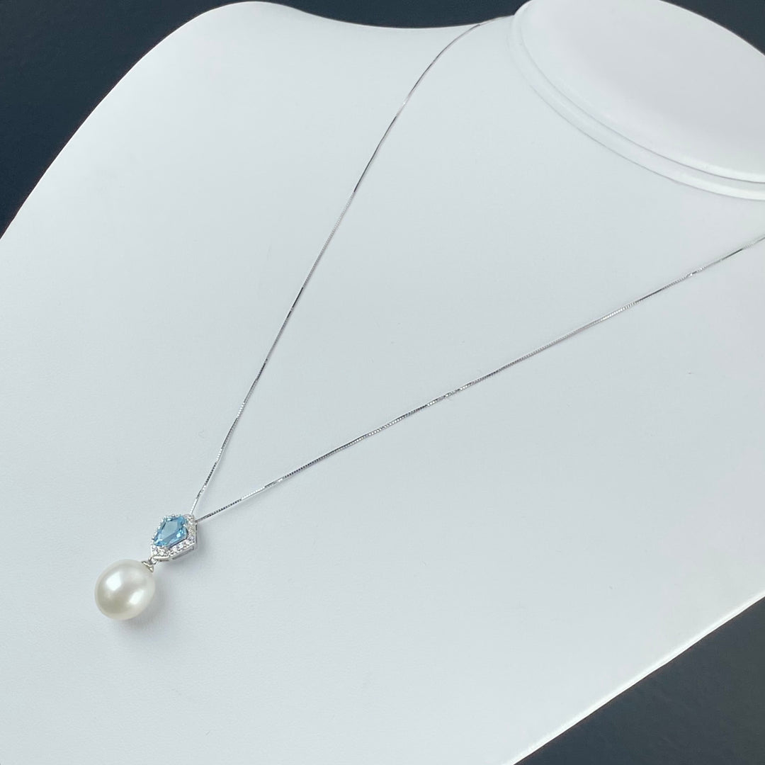 50% OFF CLEARANCE!  14k white gold exceptional blue topaz, diamond and pearl necklace