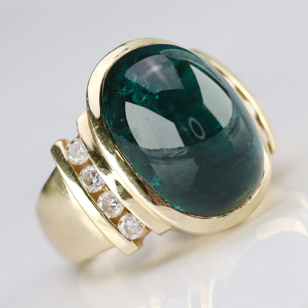 Estate green tourmaline and diamond ring in 14k yellow gold