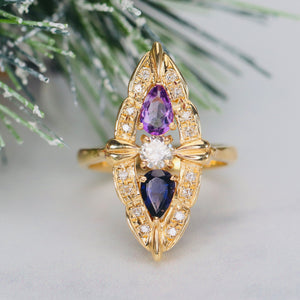 Estate multi gemstone ring in 18k yellow gold