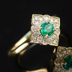 Emerald and diamond ring in 14k yellow gold