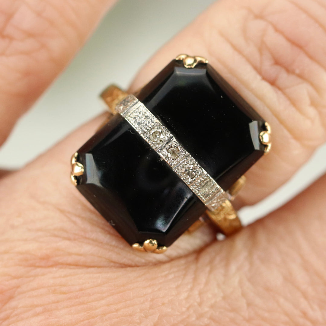 Vintage onyx and diamond ring in yellow gold