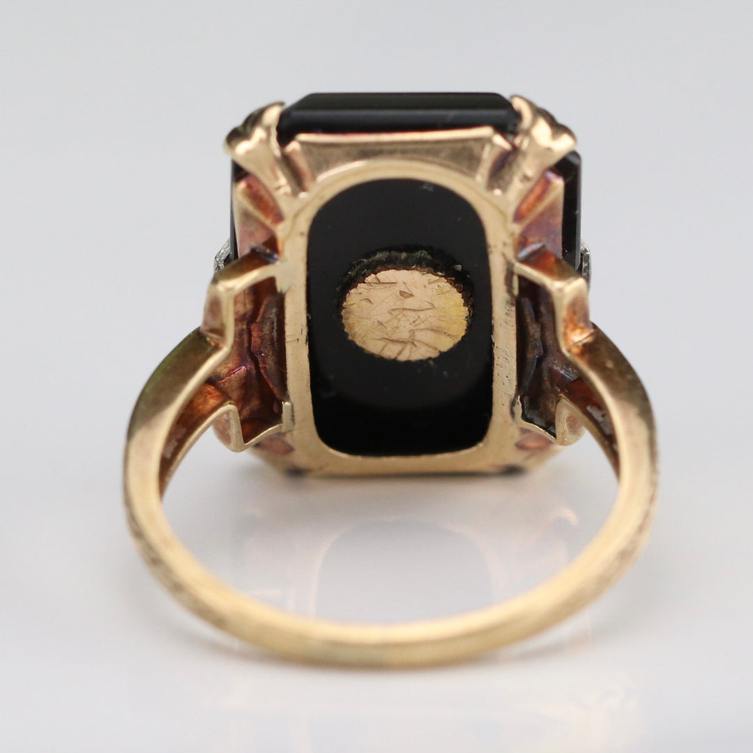 Vintage onyx and diamond ring in yellow gold