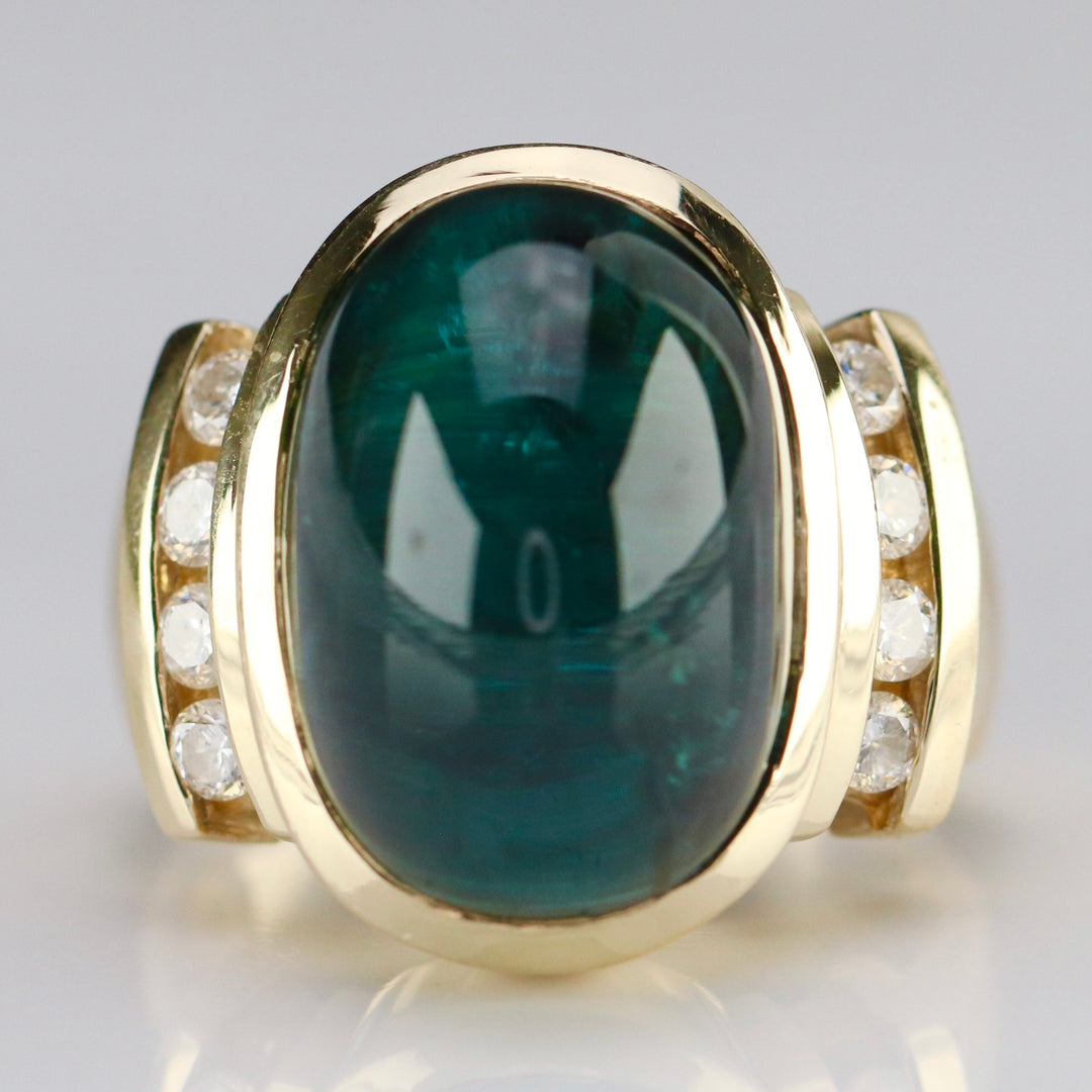 Estate green tourmaline and diamond ring in 14k yellow gold