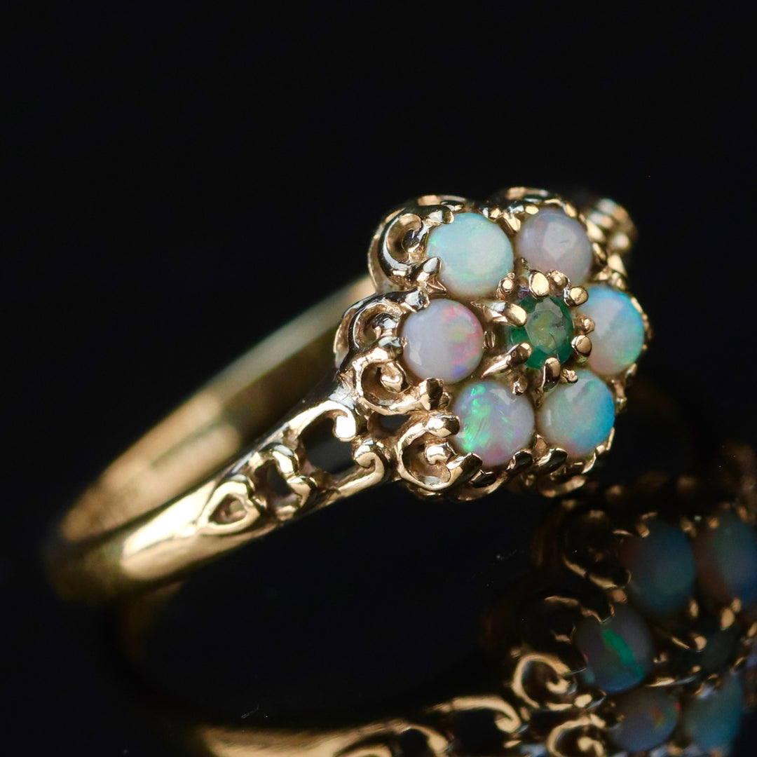 Vintage opal and emerald cluster ring in yellow gold