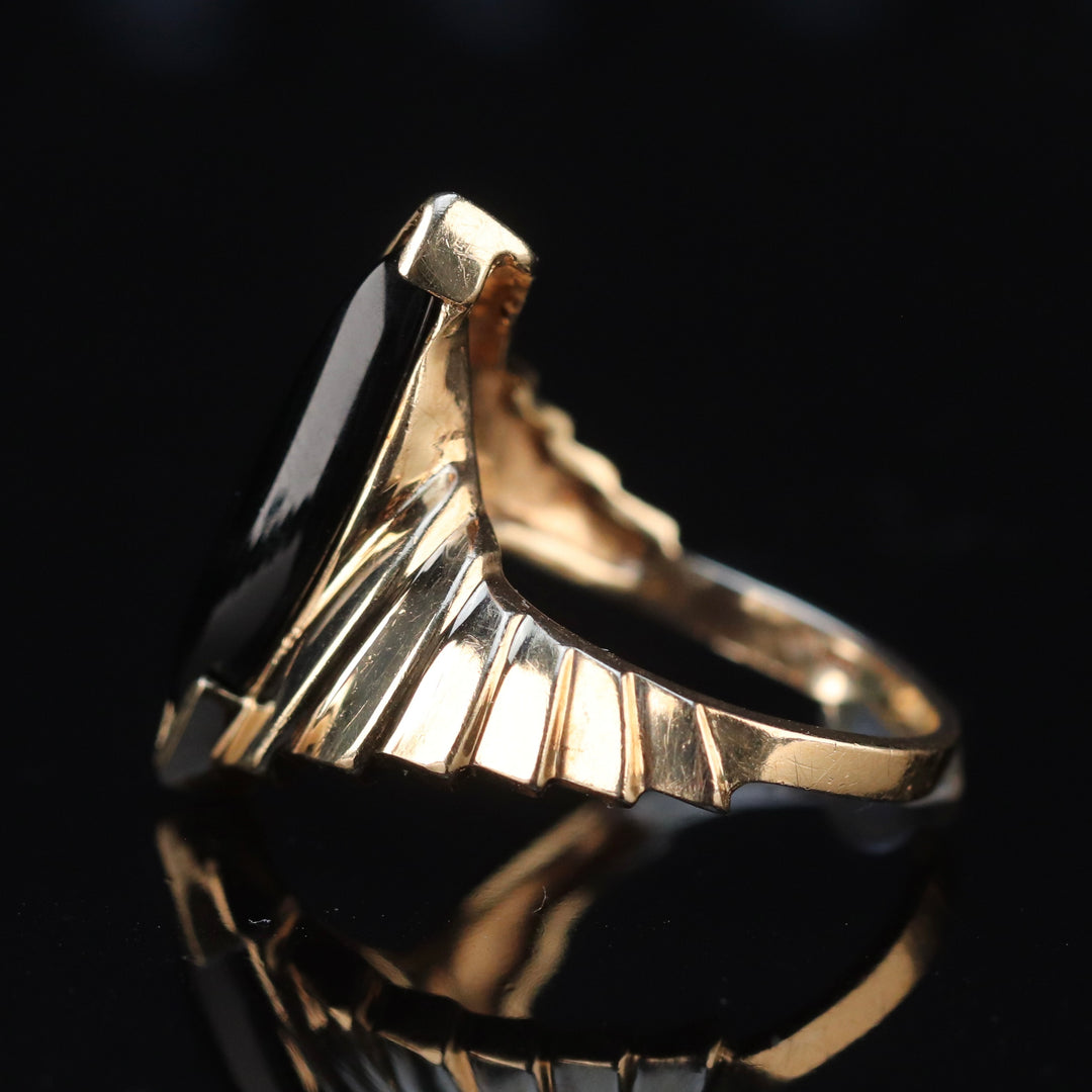 Vintage onyx navette ring in yellow gold