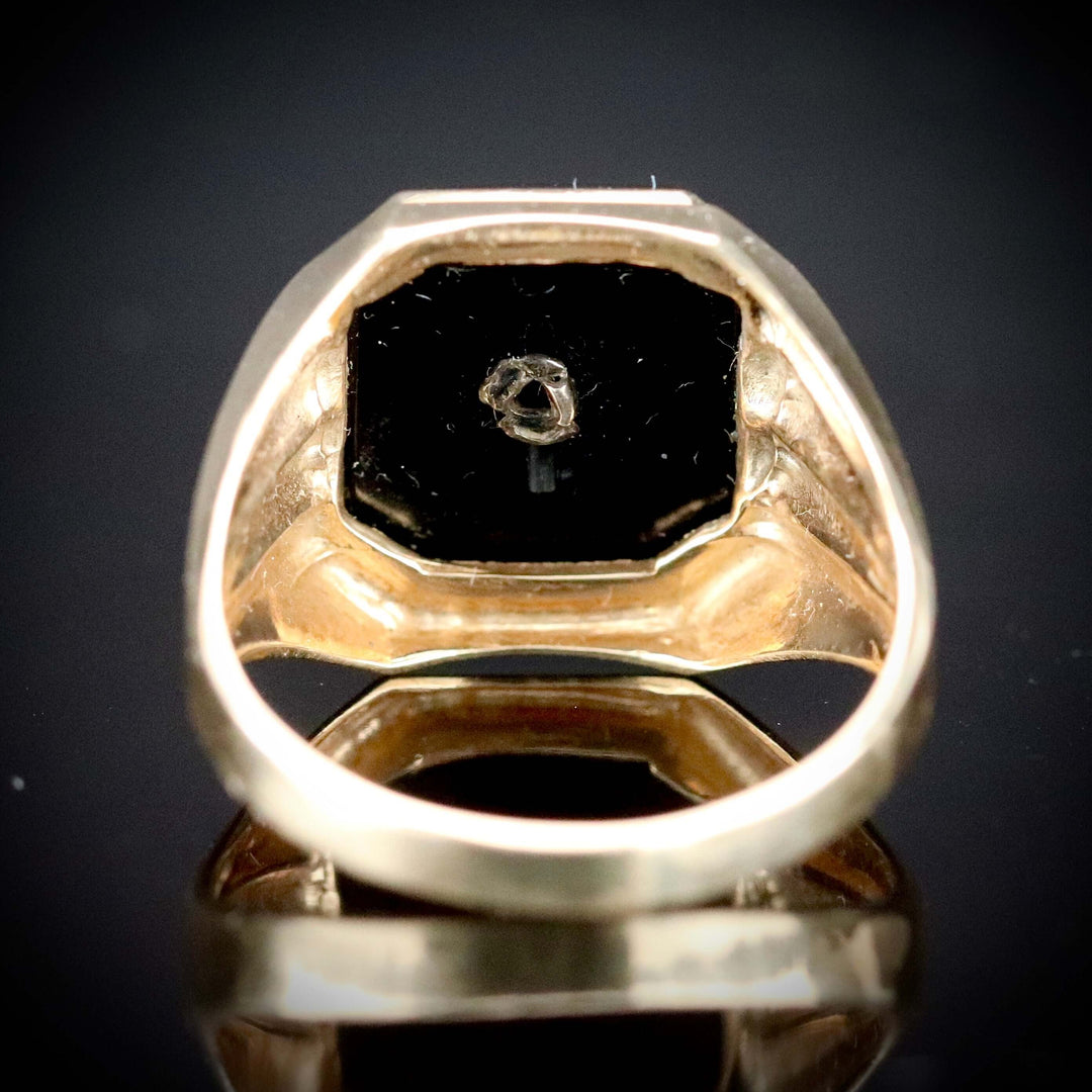 Vintage large onyx and diamond ring in yellow gold