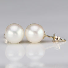 Load image into Gallery viewer, RESERVED: Classic 10mm pearl studs in 14k yellow gold