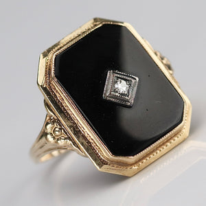 Vintage onyx and diamond ring in yellow gold