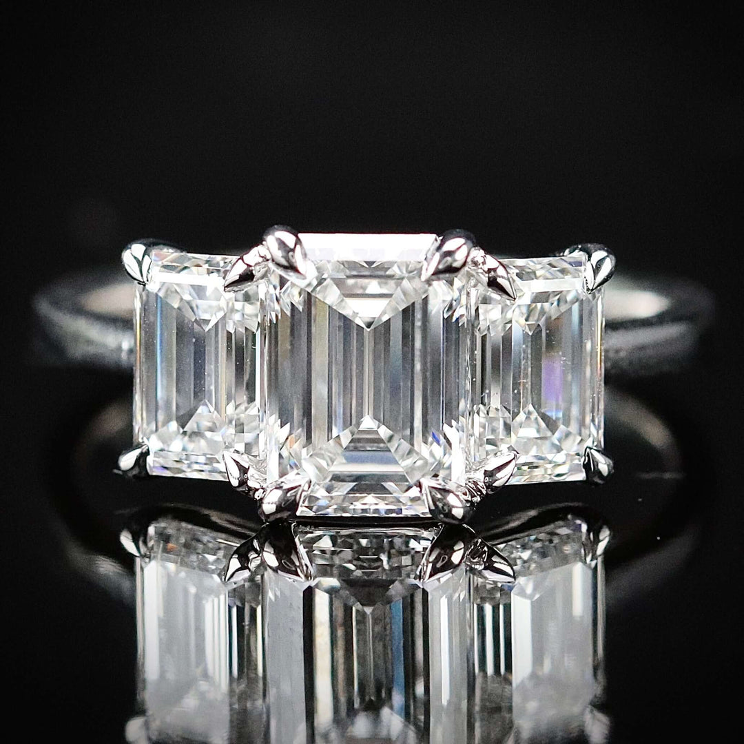 SPECIAL: MANOR ROYAL:  The Charlotte - 3 stone 3.03ctw lab grown emerald cut diamond ring in platinum