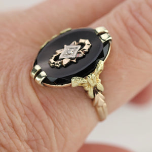 Oval vintage black onyx and diamond ring in yellow gold ring By Manor Jewels