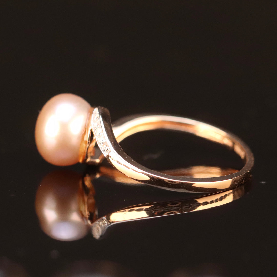 Pink pearl and diamond ring in 14k rose gold