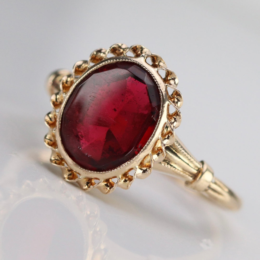 Vintage red paste ring in yellow gold