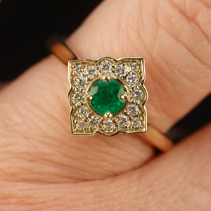 Emerald and diamond ring in 14k yellow gold