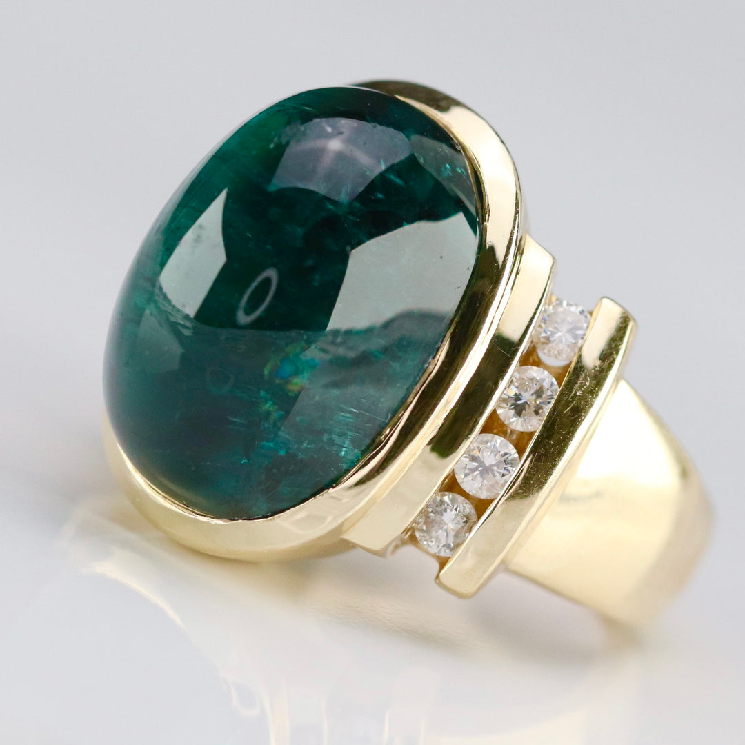 Estate green tourmaline and diamond ring in 14k yellow gold