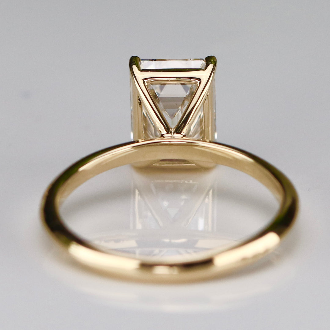 SPECIAL: 3ct emerald cut lab grown solitaire diamond ring in 14k yellow gold