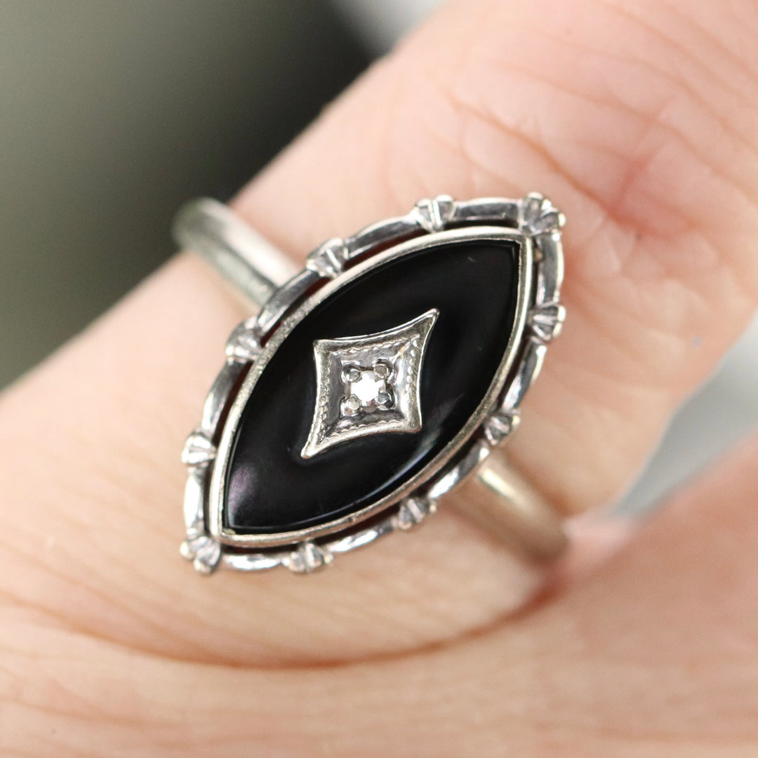 Vintage navette onyx and diamond ring in white gold