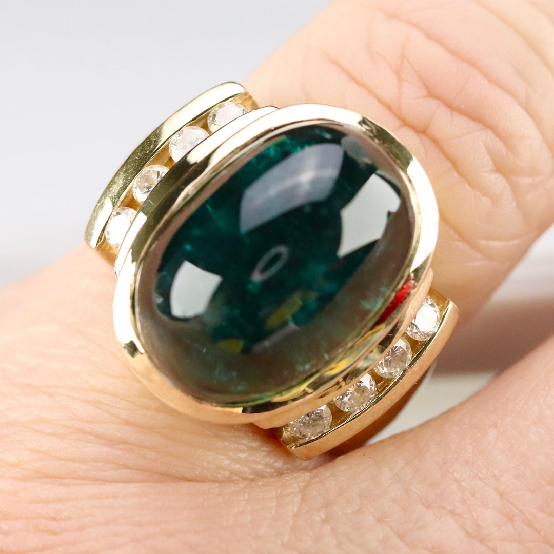 Estate green tourmaline and diamond ring in 14k yellow gold