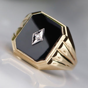 Vintage large onyx and diamond ring in yellow gold