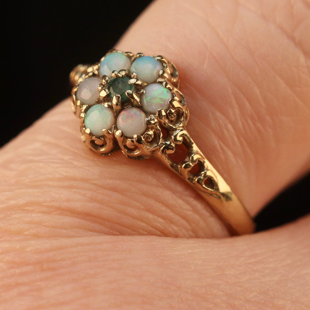 Vintage opal and emerald cluster ring in yellow gold