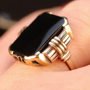 Heavy vintage onyx ring in yellow gold