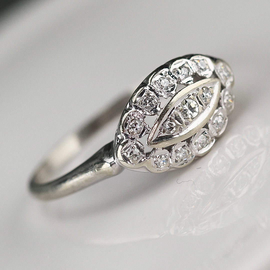 Princess style diamond ring in 14k white gold