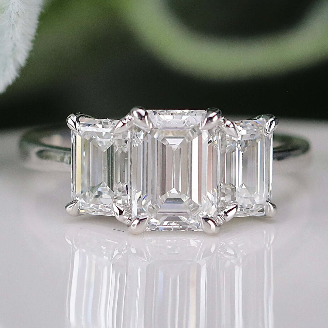 SPECIAL: MANOR ROYAL:  The Charlotte - 3 stone 3.03ctw lab grown emerald cut diamond ring in platinum