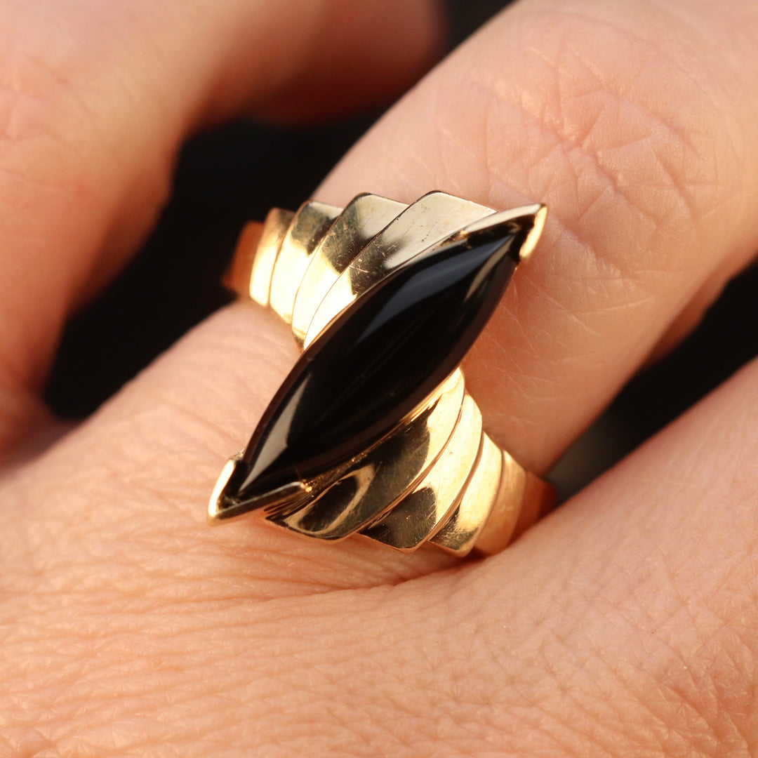 Vintage onyx navette ring in yellow gold