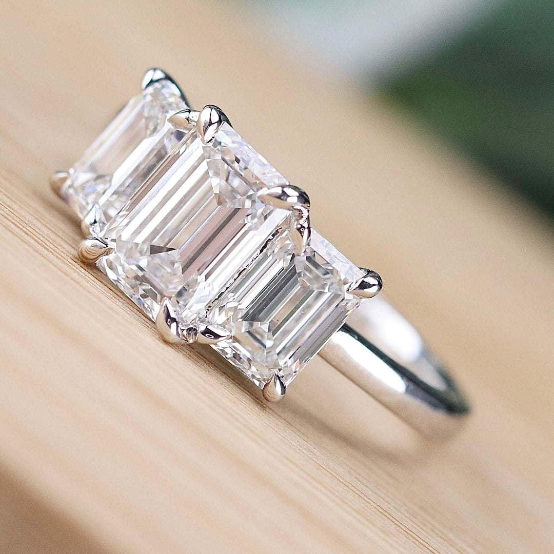 SPECIAL: MANOR ROYAL:  The Charlotte - 3 stone 3.03ctw lab grown emerald cut diamond ring in platinum