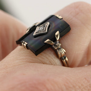 Curved onyx and diamond vintage ring in yellow gold from Manor Jewels