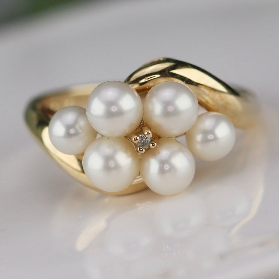 Vintage pearl and diamond ring in yellow gold