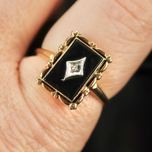 Vintage onyx and diamond ring in yellow gold