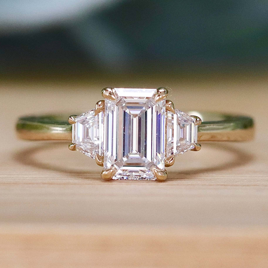 SPECIAL:  MANOR ROYAL:  The Queen Anne - 3 stone 1.40ctw lab grown emerald cut diamond ring in 14k yellow gold