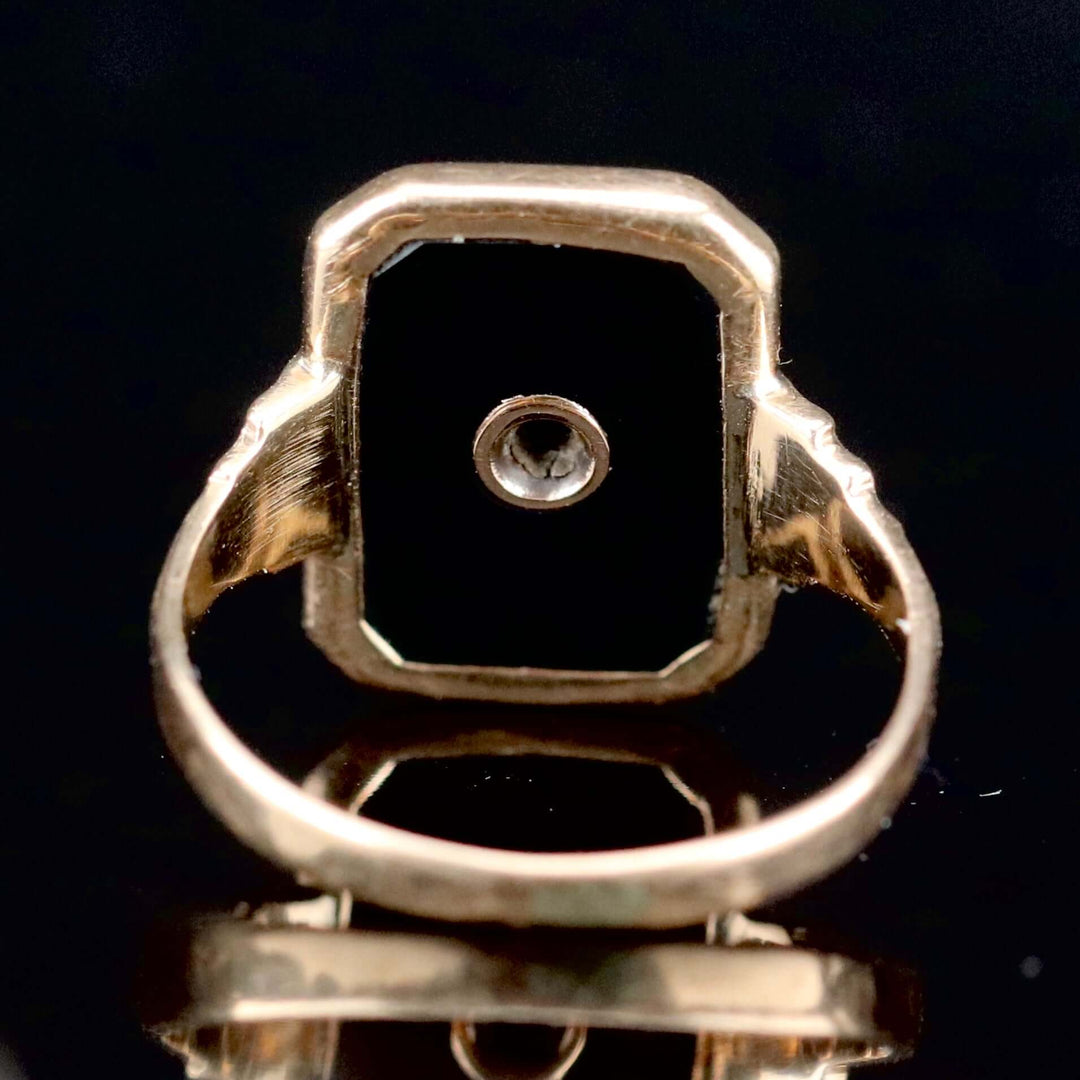 Classic vintage onyx and diamond ring in yellow gold