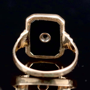 Classic vintage onyx and diamond ring in yellow gold