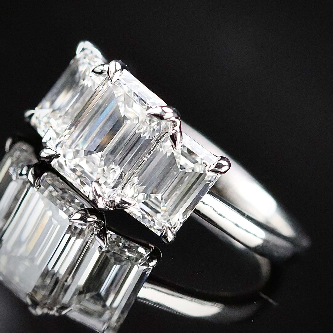 SPECIAL: MANOR ROYAL:  The Charlotte - 3 stone 3.03ctw lab grown emerald cut diamond ring in platinum