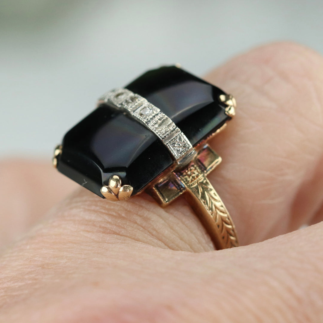 Vintage onyx and diamond ring in yellow gold