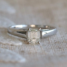 Load image into Gallery viewer, Estate emerald cut diamond solitaire ring in 18k white gold