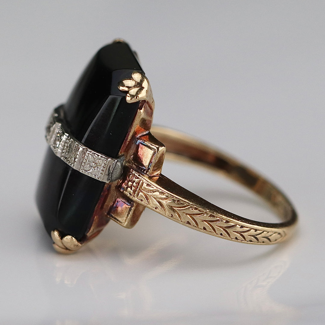 Vintage onyx and diamond ring in yellow gold