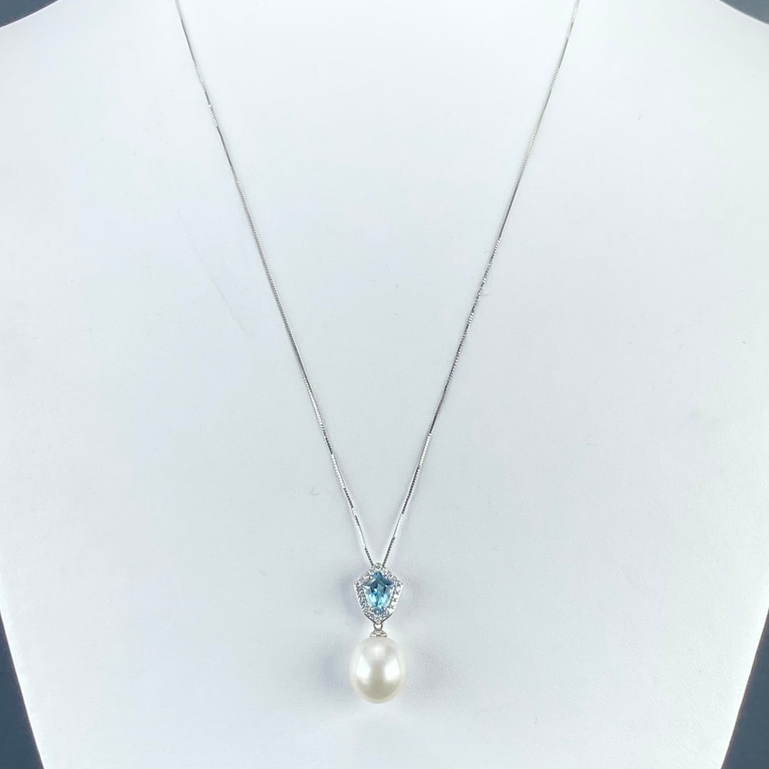 50% OFF CLEARANCE!  14k white gold exceptional blue topaz, diamond and pearl necklace