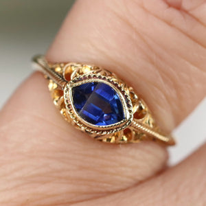 Vintage marquise cut lab grown blue sapphire ring in yellow gold