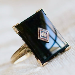 Large onyx and diamond vintage ring in yellow gold from Manor Jewels