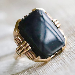 Heavy vintage onyx ring in yellow gold