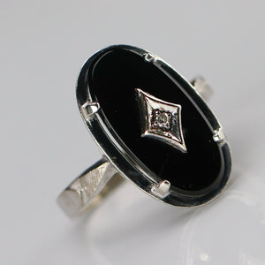 Oval onyx and diamond vintage ring in white gold from Manor Jewels