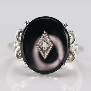 Vintage Onyx and diamond ring in white gold