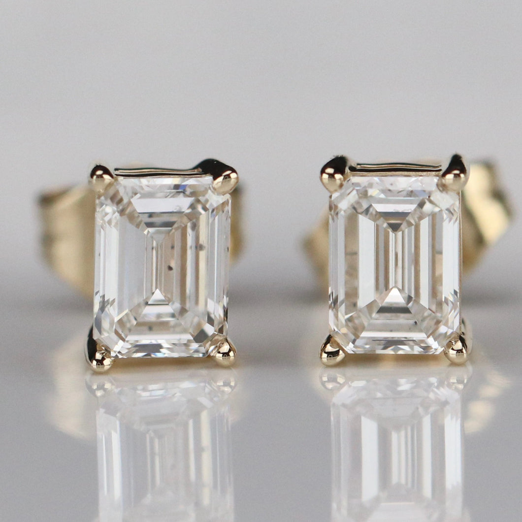 1ctw emerald cut Lab Grown Diamond studs in 14k yellow gold