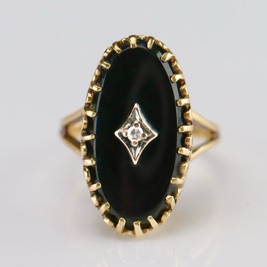 Classic vintage onyx and diamond ring in yellow gold