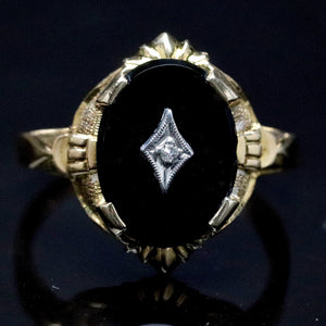 Vintage onyx and diamond ring in yellow gold