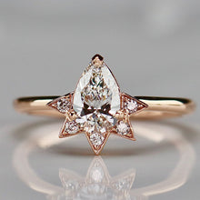 Load image into Gallery viewer, Pear shaped lab grown diamond and earth mined diamond ring in 14k rose gold