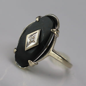 Onyx and diamond ring in white gold