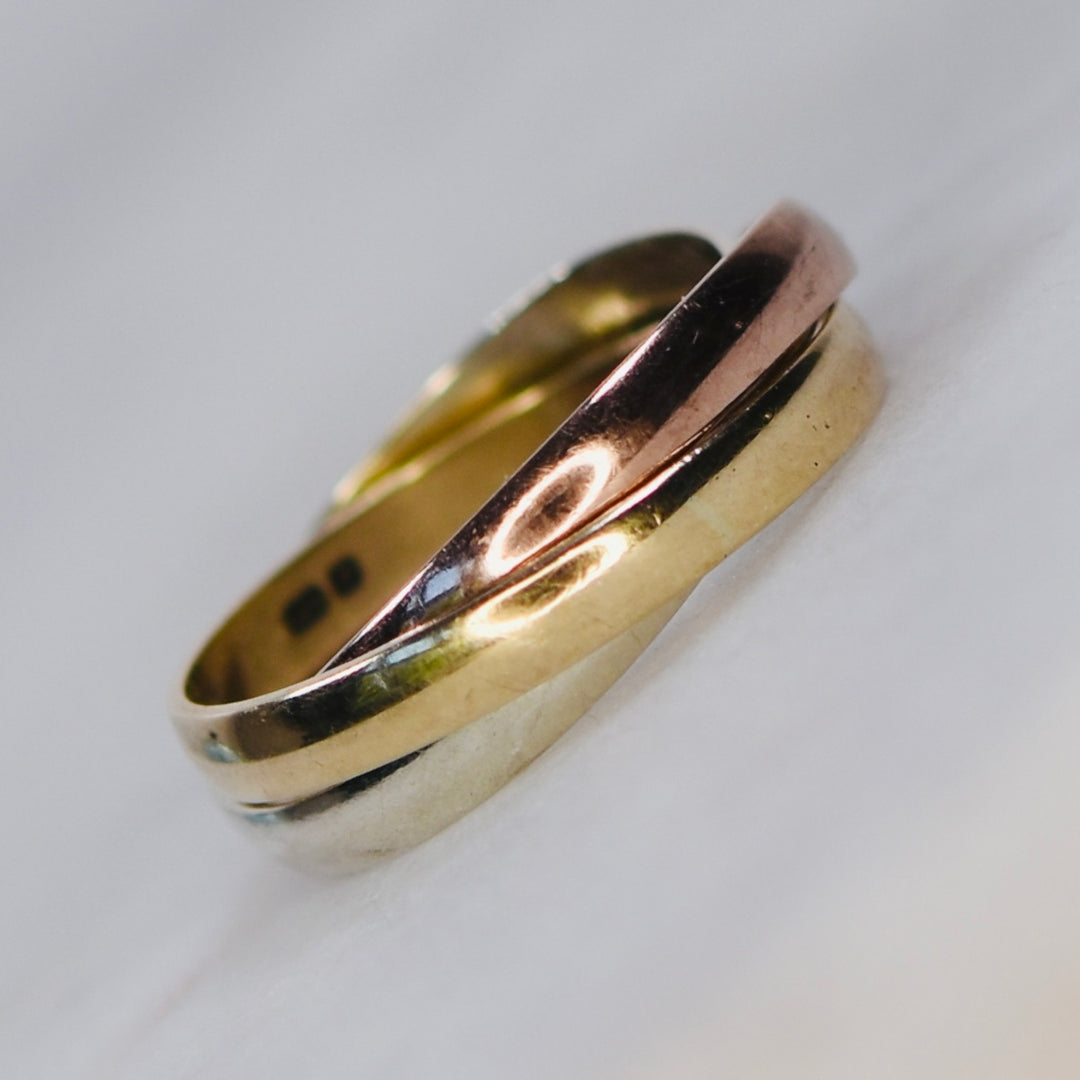 Vintage rolling ring in tri color gold from Manor Jewels